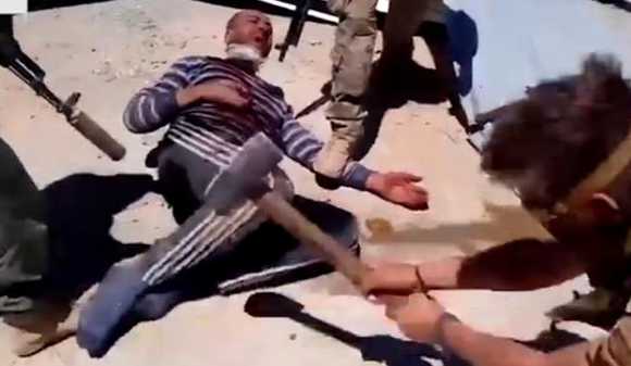 Русские палачи в жестокой расправе над сирийцем.